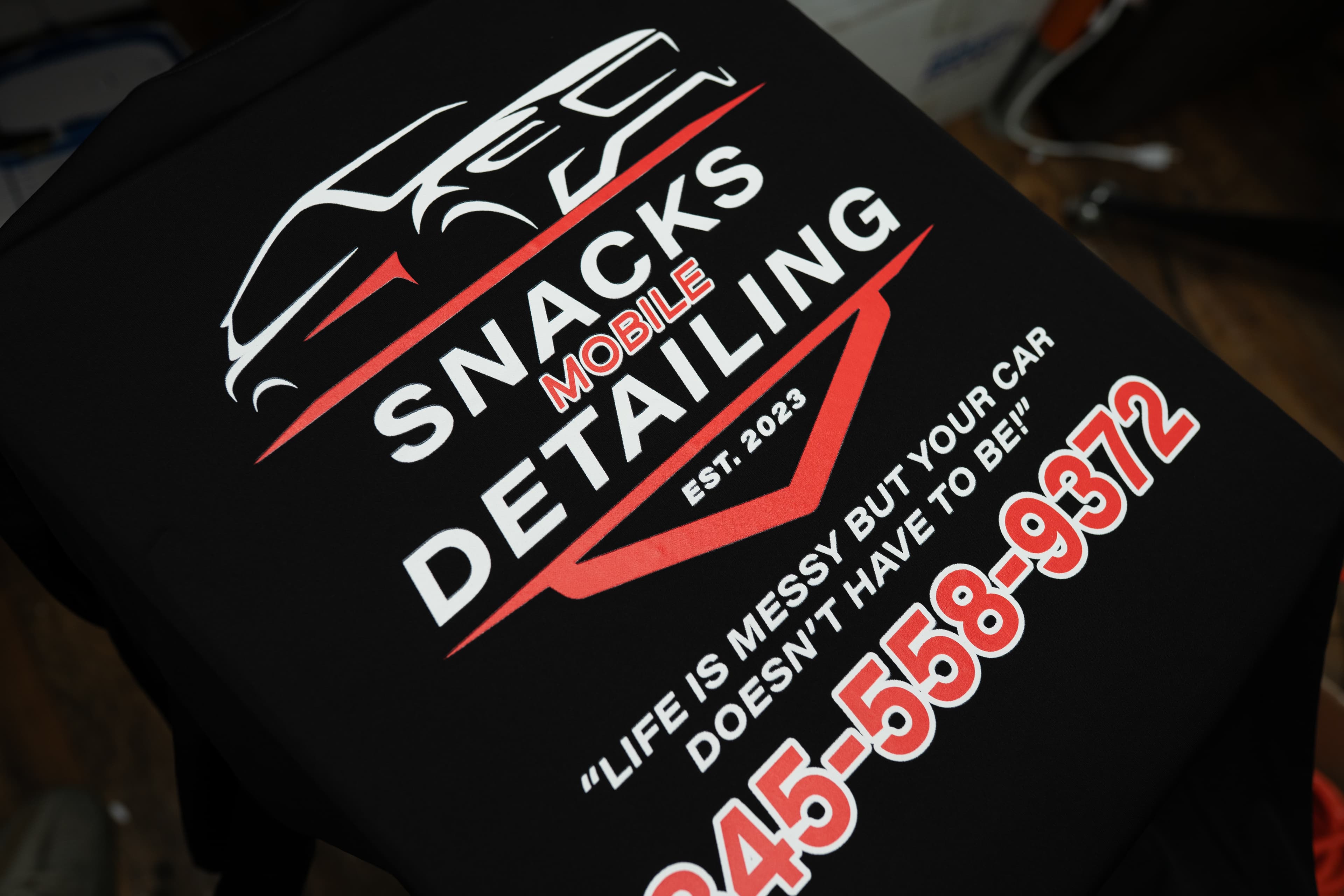Different custom apparel decoration methods including screen printing and embroidery at Rolled Up Tees Nyack NY